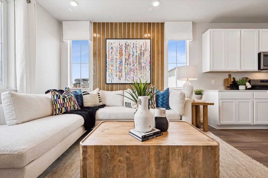 A living room with a couch and a coffee table.