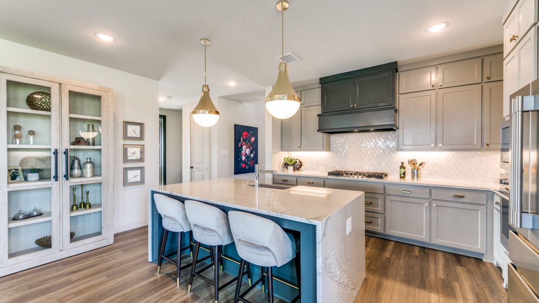 Furnished interior in a model home at Estates at Stacy Crossing in McKinney (Image 24).