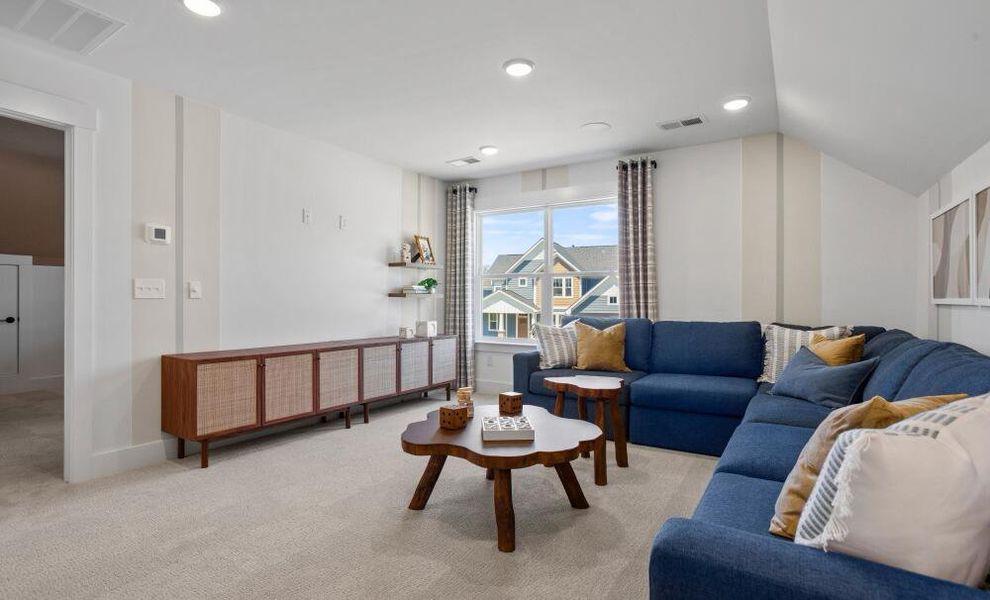 Furnished interior in a model home at The Enclave at Hidden Lake - 55+ Community in Youngsville (Image 19).