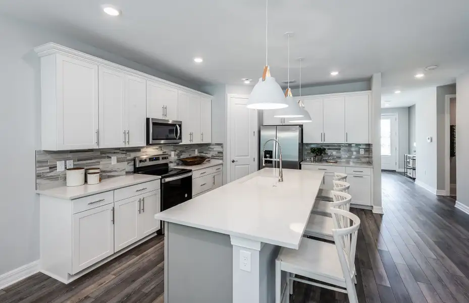 Kitchens with Stylish Finishes  in this new home community in North Port, Florida