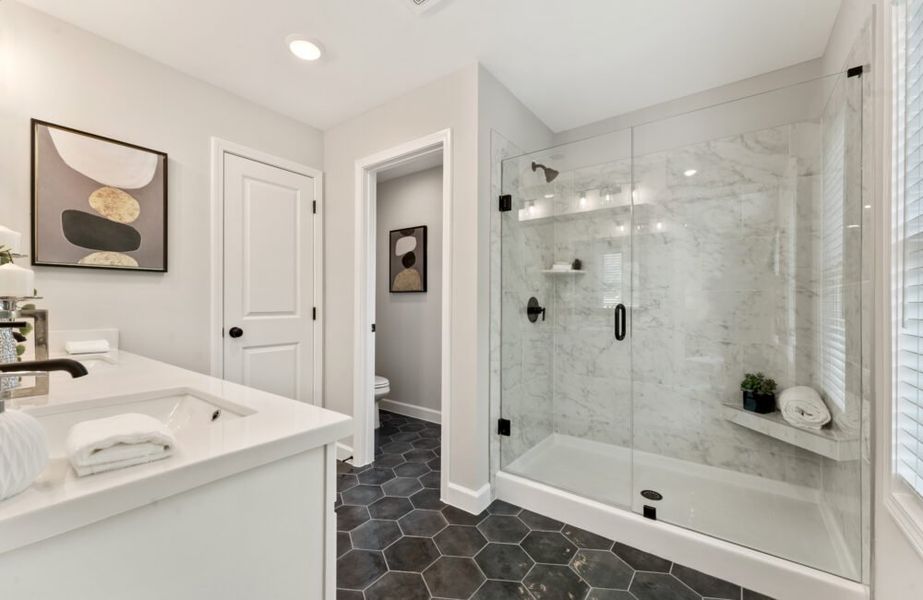 Furnished interior in a model home at Wildwood Place in Powder Springs (Image 9).