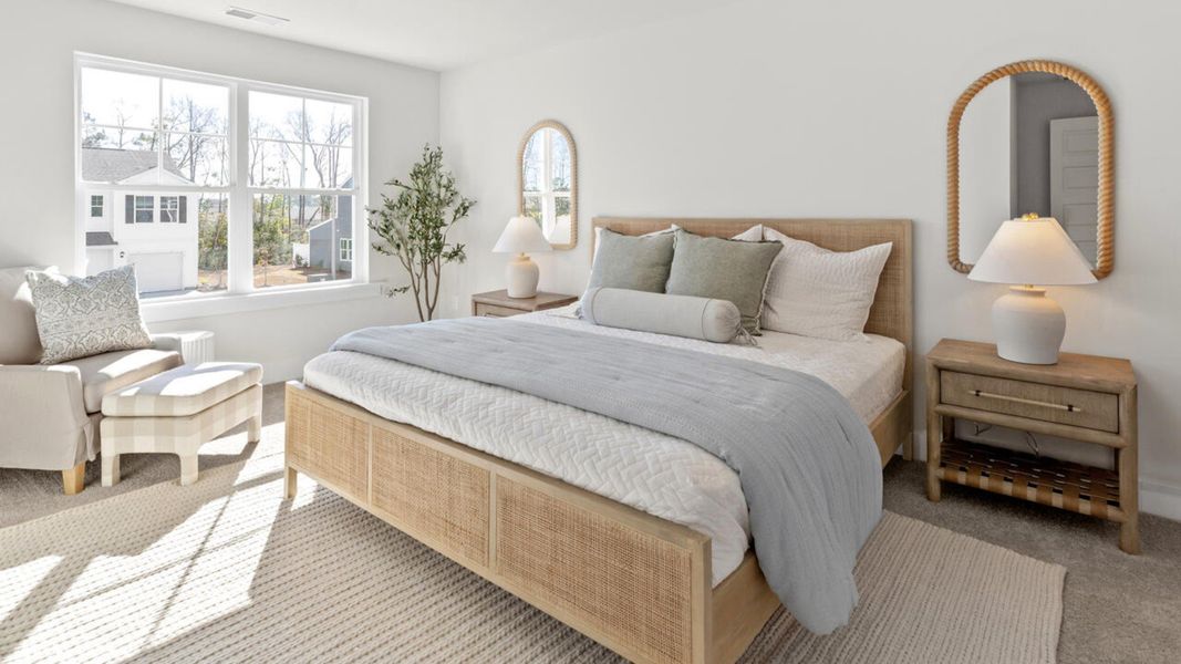 Furnished interior in a model home at Waterside Townhomes in Surf City (Image 20).