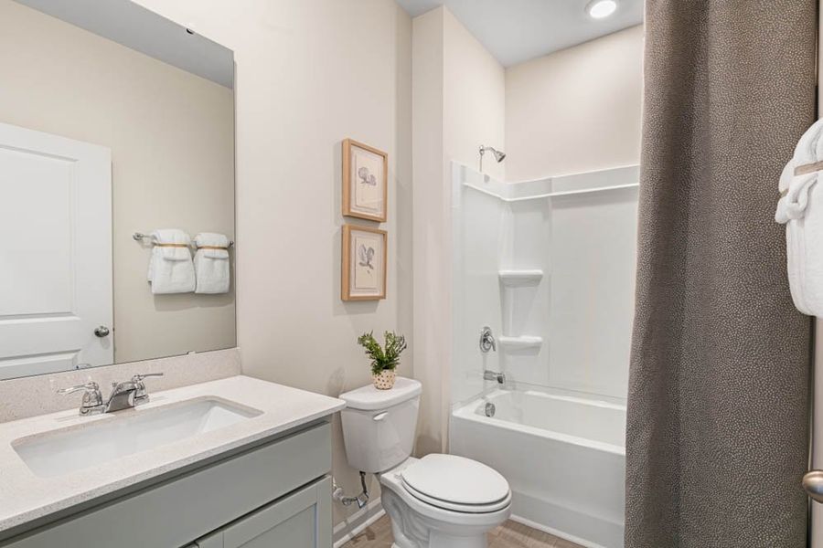 Furnished interior in a model home at Southbury in Carthage (Image 28).