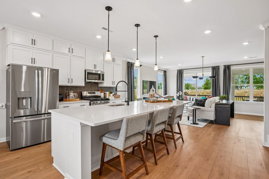 Furnished interior in a model home at South Lake Townes at Flowers Plantation in Clayton (Image 11).