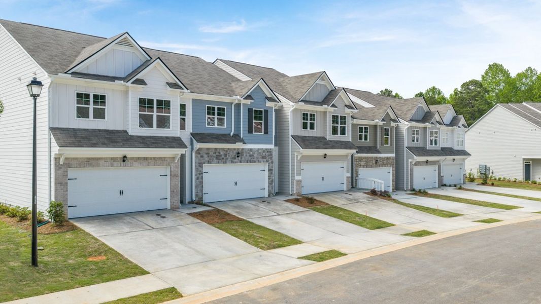 Front exterior of a home in the Falcon Landing Townhomes community, located in Gainesville, GA (Image 3).