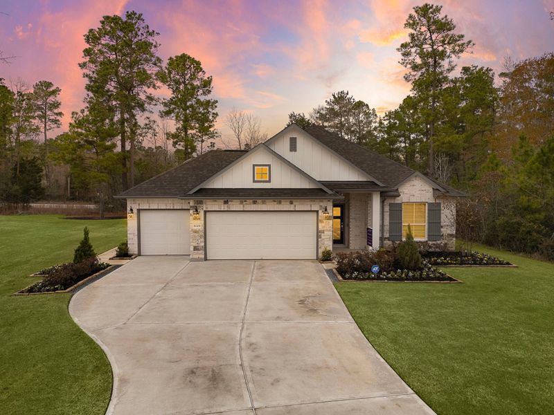 A house with a driveway. A house with a driveway.