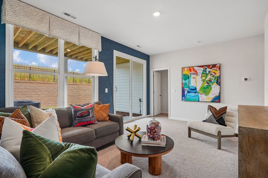 Furnished interior in a model home at South Lake Townes at Flowers Plantation in Clayton (Image 59).