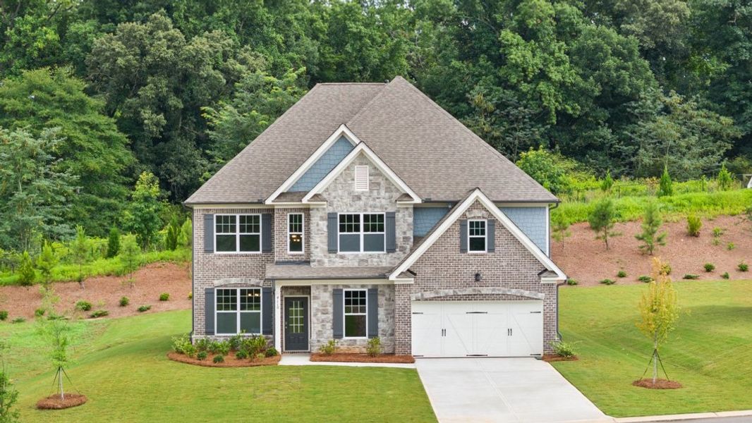 Front exterior of a home in the Haven Abbey community, located in Cumming, GA (Image 4).