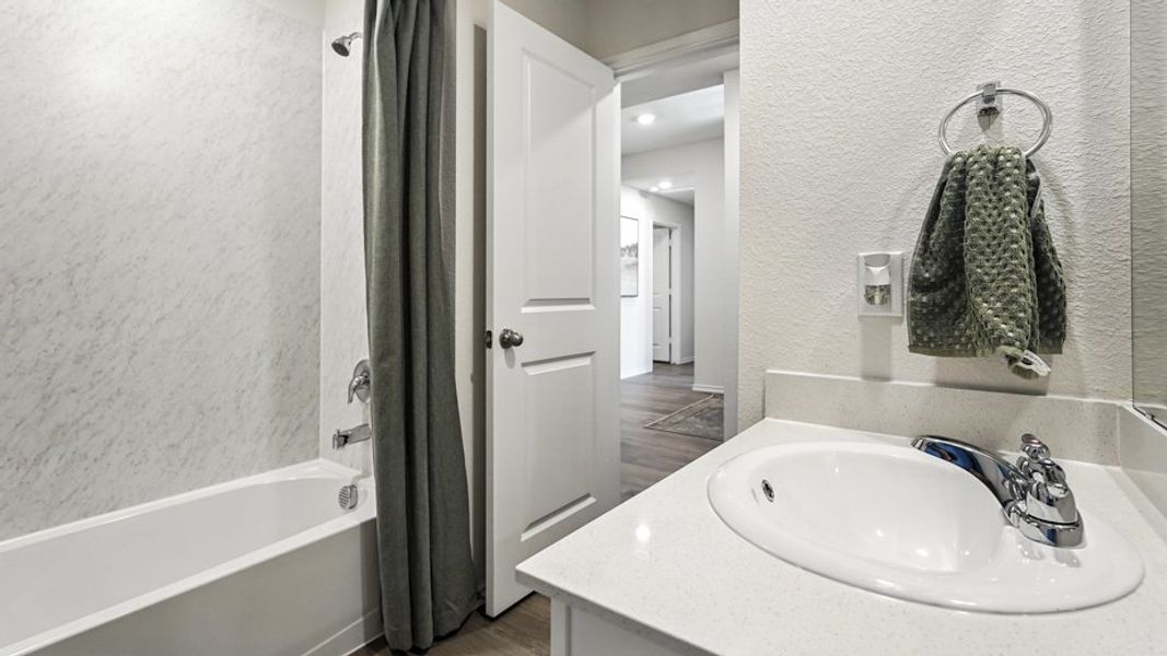 Furnished interior in a model home at Saddlebrook in Waxahachie (Image 17).