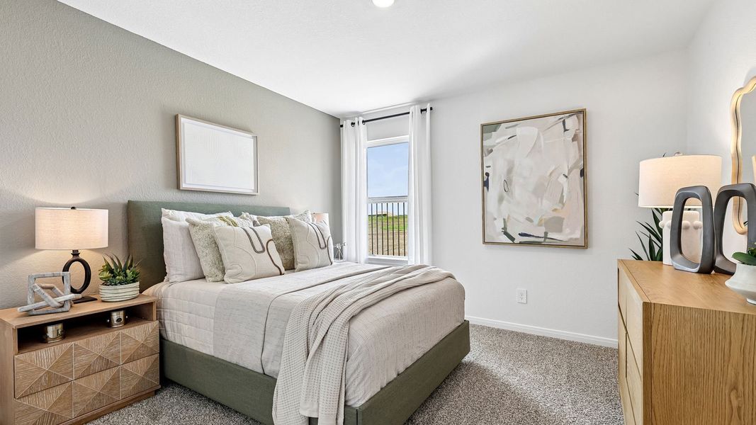 Furnished interior in a model home at Revelry in Del Valle (Image 40). Furnished interior in a model home at Revelry in Del Valle (Image 40).