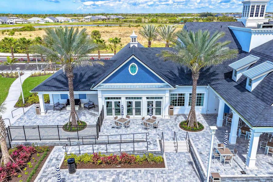 Front exterior of a home in the Palmera Wellen Park – Executive Series community, located in Venice, FL (Image 6).