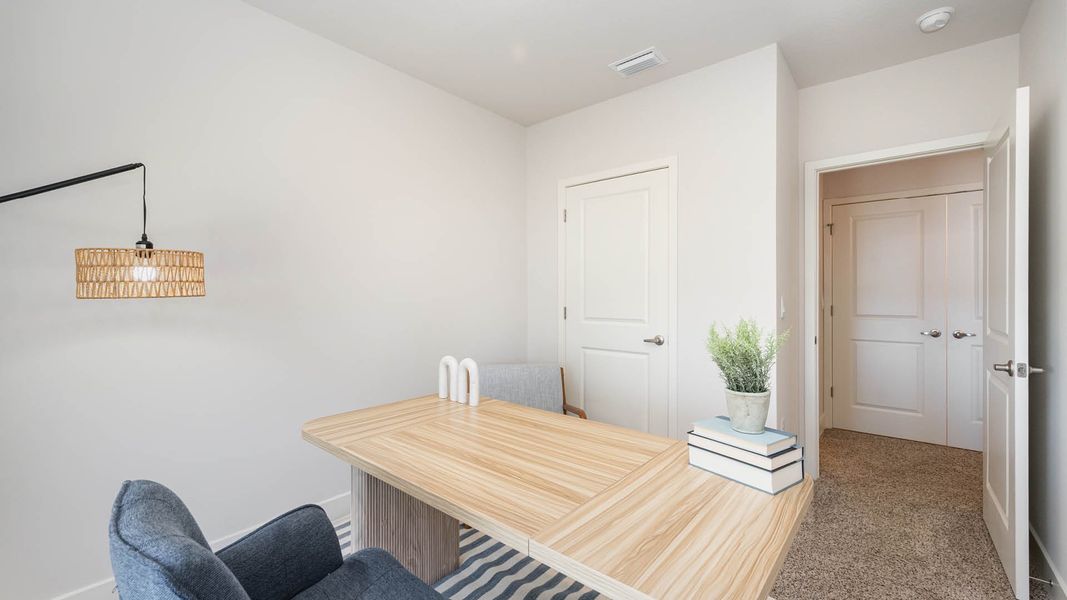 Furnished interior in a model home at Tortuga Cay in Satellite Beach (Image 19).