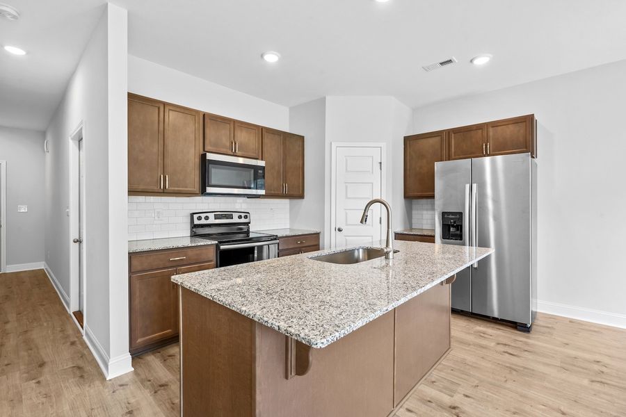 Furnished interior in a model home at Marin Woods Townhomes in Smithfield (Image 7).