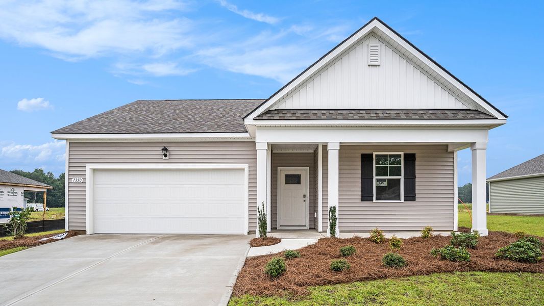 Front exterior of a home in the Evington Place community, located in Longs, SC (Image 15).