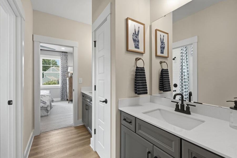 Furnished interior in a model home at Rock Creek in Denver (Image 43).