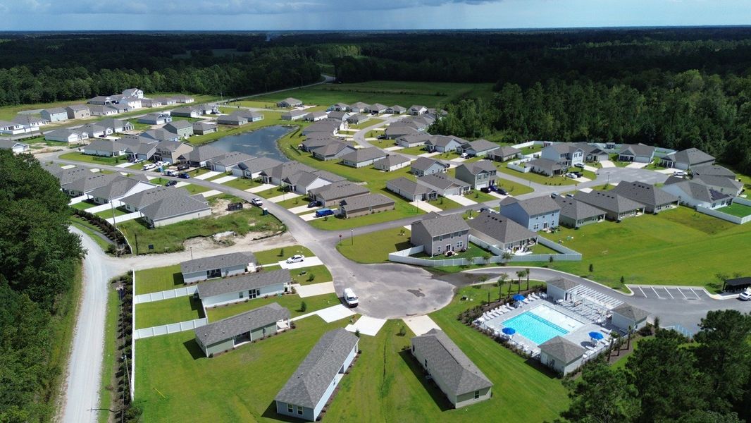 Aerial view of the Cottonwood Place community in Tabor City, NC, showing layout and nearby surroundings (Image 8). Aerial view of the Cottonwood Place community in Tabor City, NC, showing layout and nearby surroundings (Image 8).