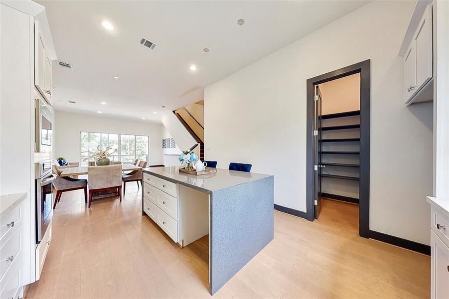 Furnished interior in a model home at Edwards in The Woodlands (Image 9).