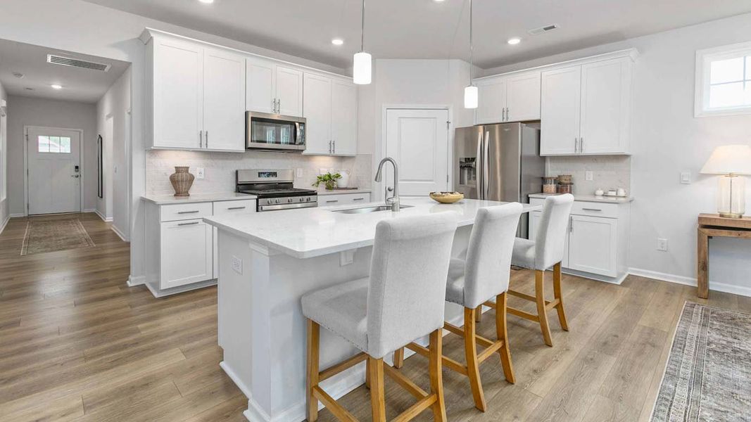 Furnished interior in a model home at Quarry Hills - Freedom in Swepsonville (Image 9).