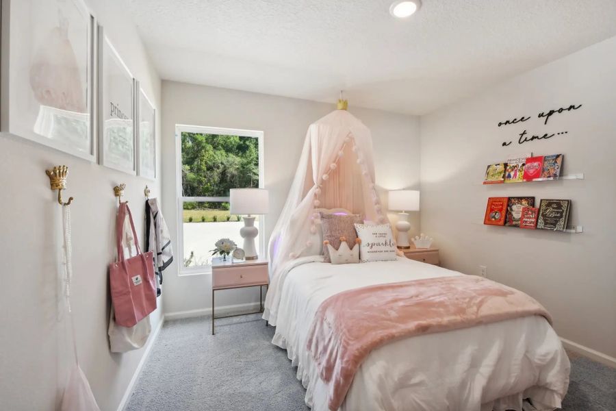 Furnished interior in a model home at The Collection at Bradbury Creek in Haines City (Image 15).
