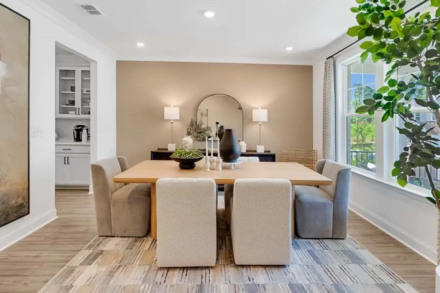 Furnished interior in a model home at Nichols Farm in Dacula (Image 4).