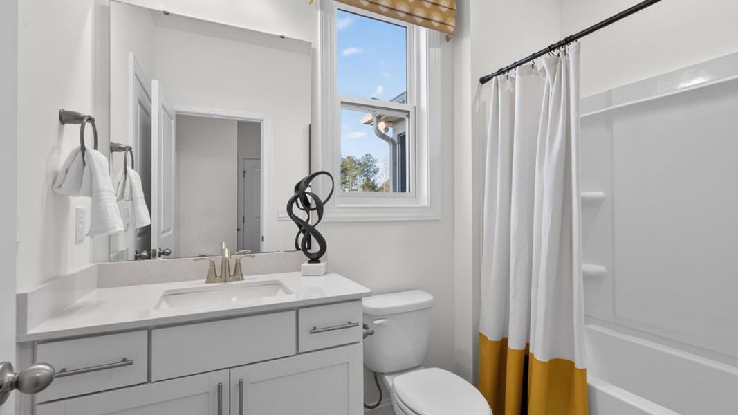 Furnished interior in a model home at The Grove at Winston Pointe in Clayton (Image 34).