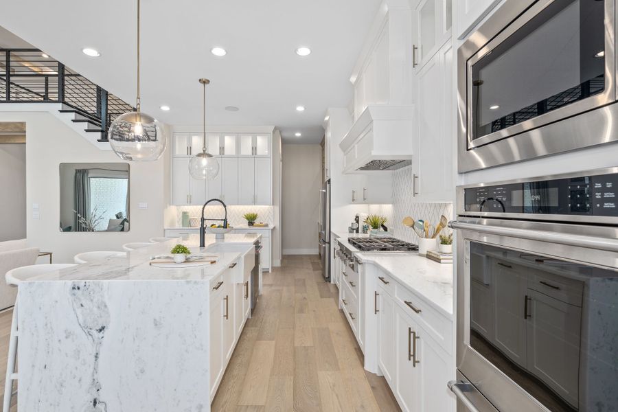 Plan 1640 Kitchen - Mosaic 60s Model - Photo by American Legend Homes