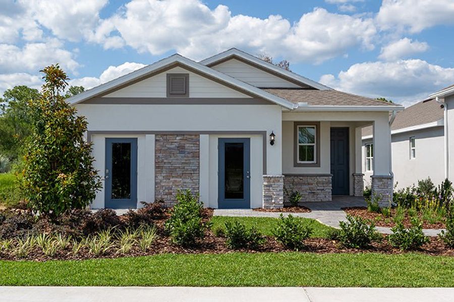 Front exterior of a home in the Liberty Station Single Family community, located in Orange City, FL (Image 2). Front exterior of a home in the Liberty Station Single Family community, located in Orange City, FL (Image 2).