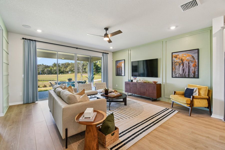 Furnished interior in a model home at Oakfield at Mount Dora Cottage Series in Mount Dora (Image 22).