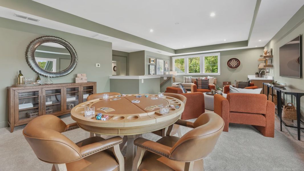 Furnished interior in a model home at The Courtyards by The Manor in Alpharetta (Image 17).