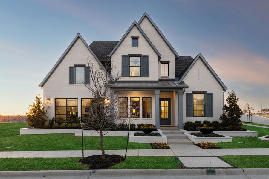 Front exterior of a home in the Painted Tree 60' Series community, located in McKinney, TX (Image 4).