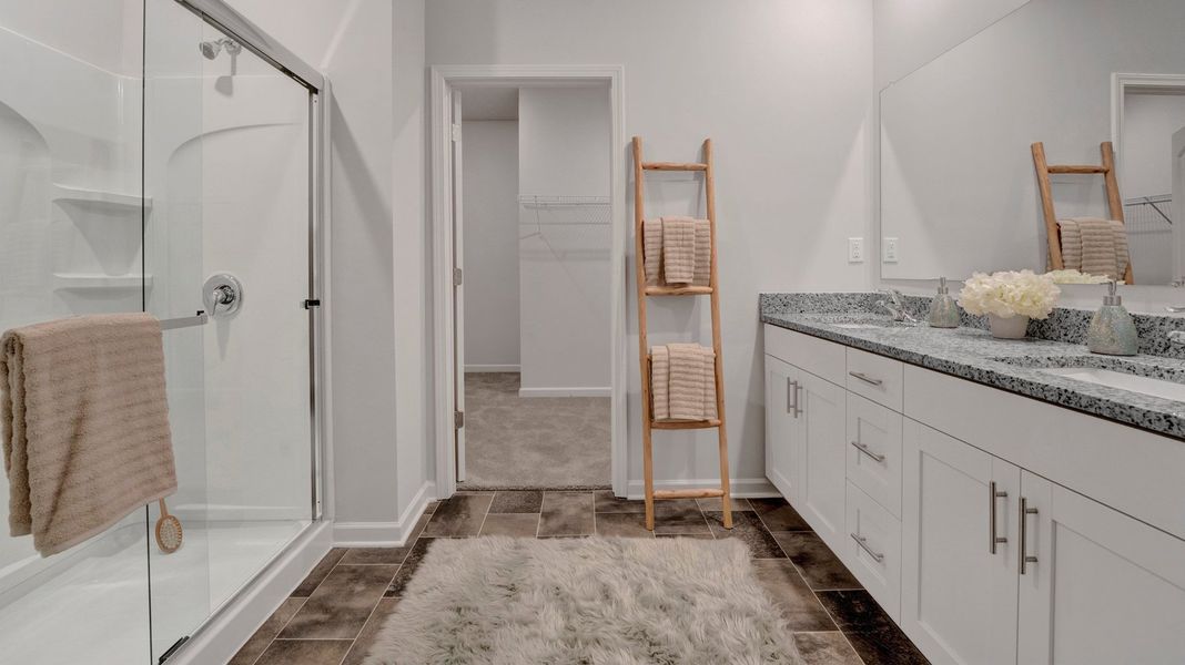 Furnished interior in a model home at Riverwood Gardens in Oakland (Image 39).