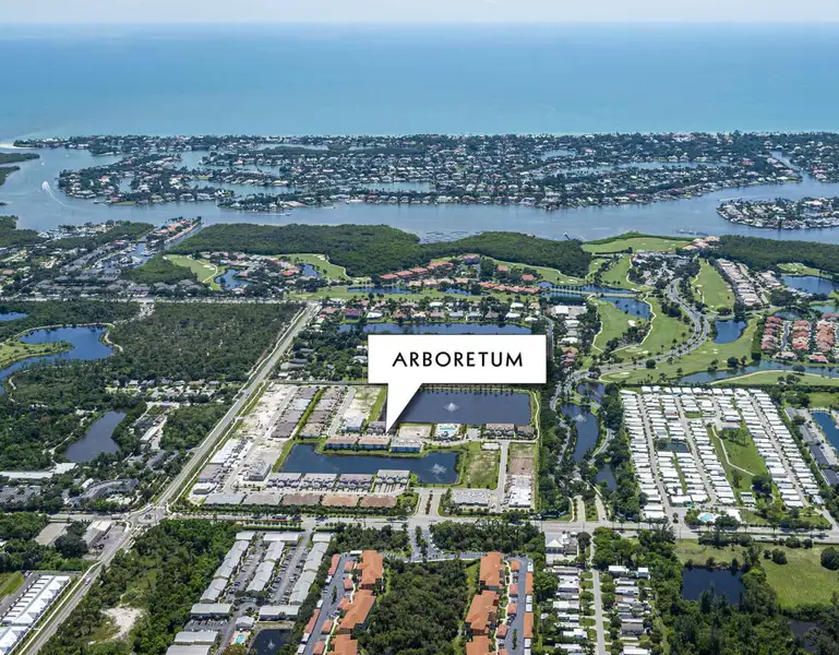 Aerial view of the Arboretum community in Naples, FL, showing layout and nearby surroundings (Image 1).