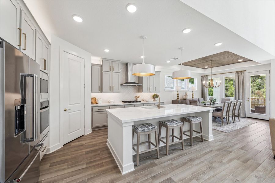 Furnished interior in a model home at The Woodlands Hills – 55' in Willis (Image 13).