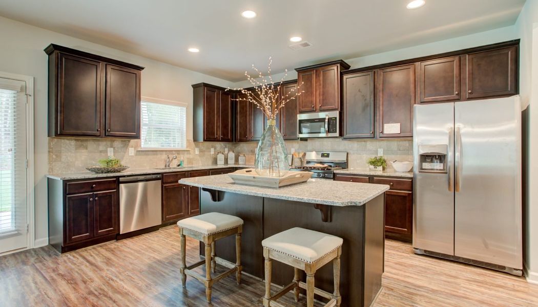 Furnished interior in a model home at Westbury in Griffin (Image 17).