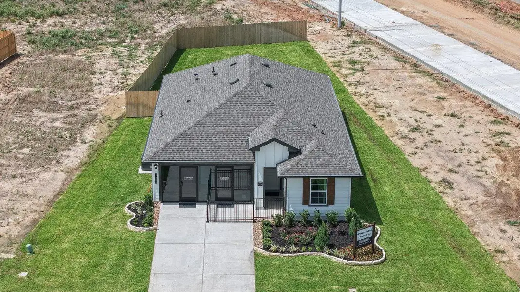 Aerial view of the Wilkins Valley community in Brenham, TX, showing layout and nearby surroundings (Image 1).