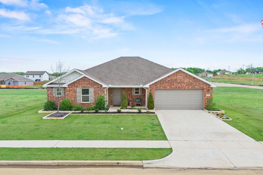 A house with a driveway. A house with a driveway.