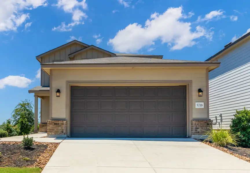 Front exterior of a home in the Blue Ridge Ranch community, located in San Antonio, TX (Image 2).
