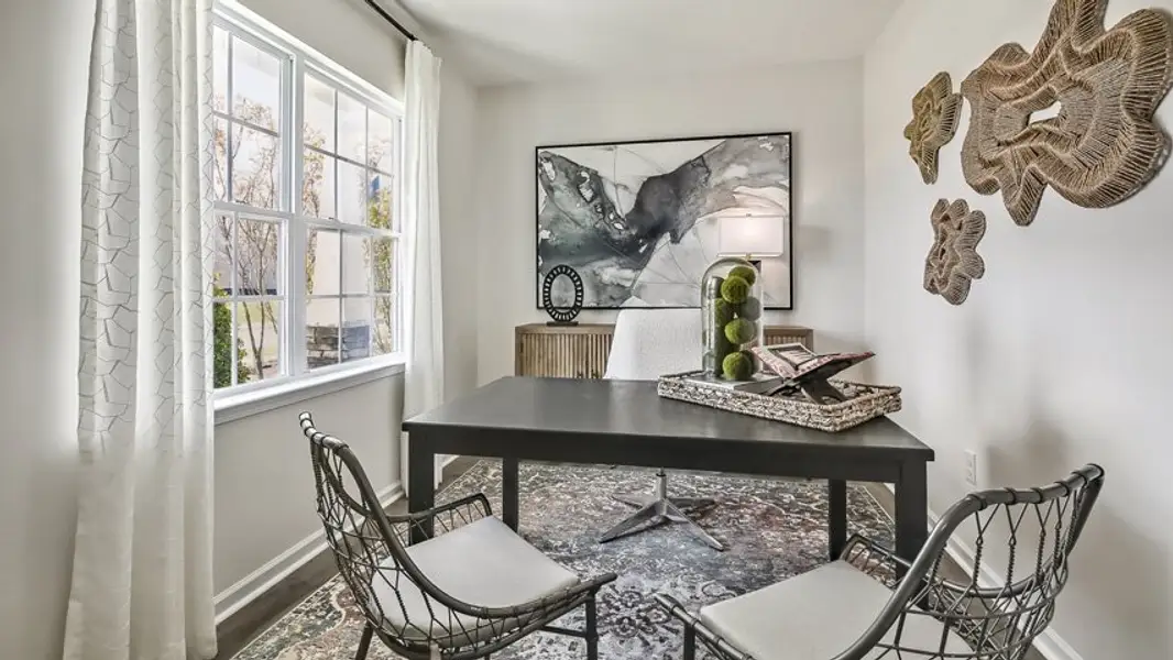 Furnished interior in a model home at The Reserve at Prestleigh in Wake Forest (Image 50).