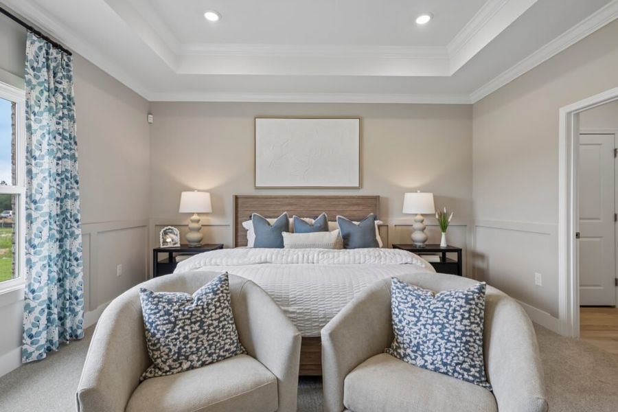 Furnished interior in a model home at Mahogany At Jubilee in Pace (Image 29).