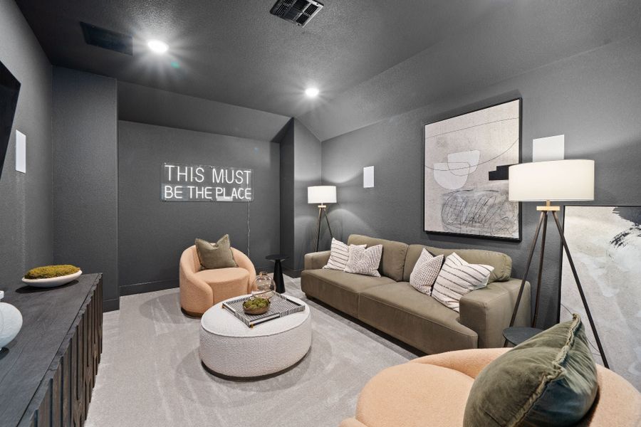 Furnished interior in a model home at Parmer Ranch in Georgetown (Image 28).