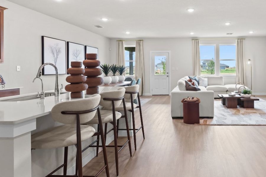 A kitchen and living room. A kitchen and living room.