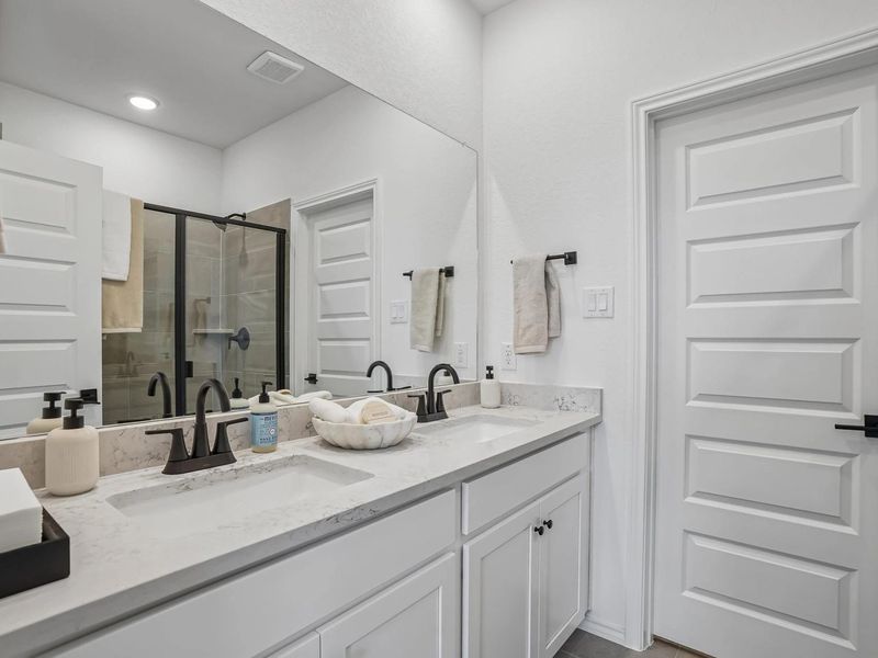 Furnished interior in a model home at Fairway Crossing in Converse (Image 11).