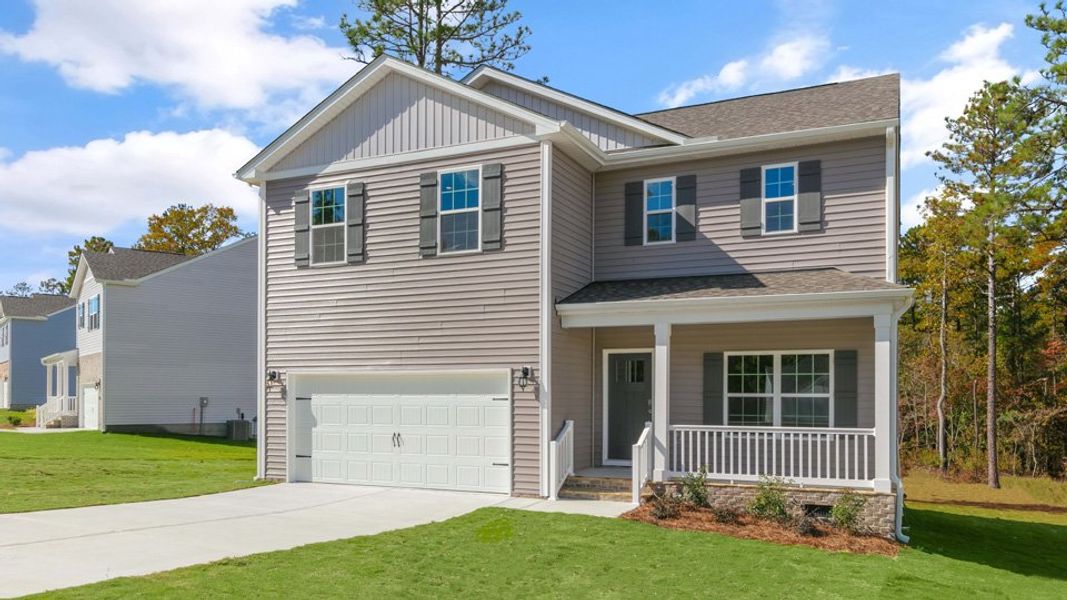 Front exterior of a home in the Gretchen Pines community, located in West End, NC (Image 12). Front exterior of a home in the Gretchen Pines community, located in West End, NC (Image 12).