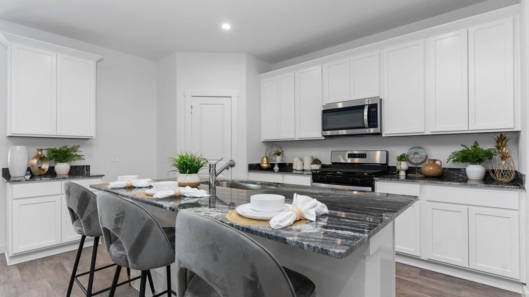 Furnished interior in a model home at August Trails in Needville (Image 17).