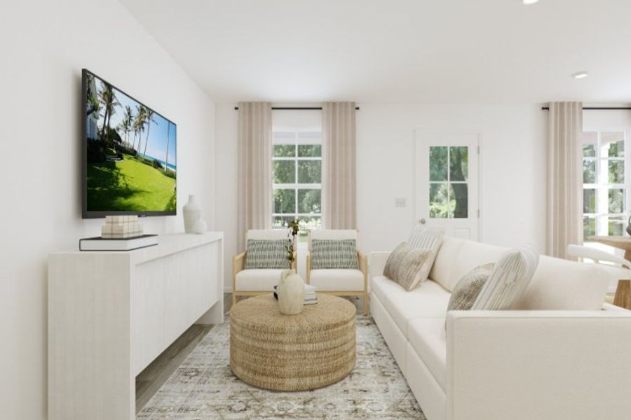 A living room with a tv and couches.
