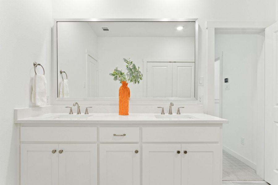 Furnished interior in a model home at Windsong Ranch Townhomes in Prosper (Image 41).