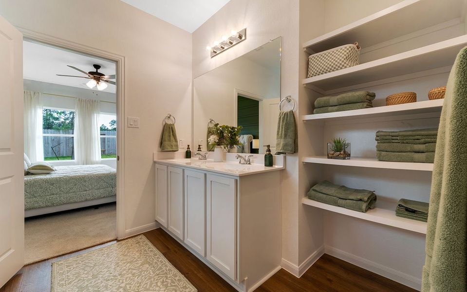 Furnished interior in a model home at The Pines at Seven Coves in Willis (Image 25).