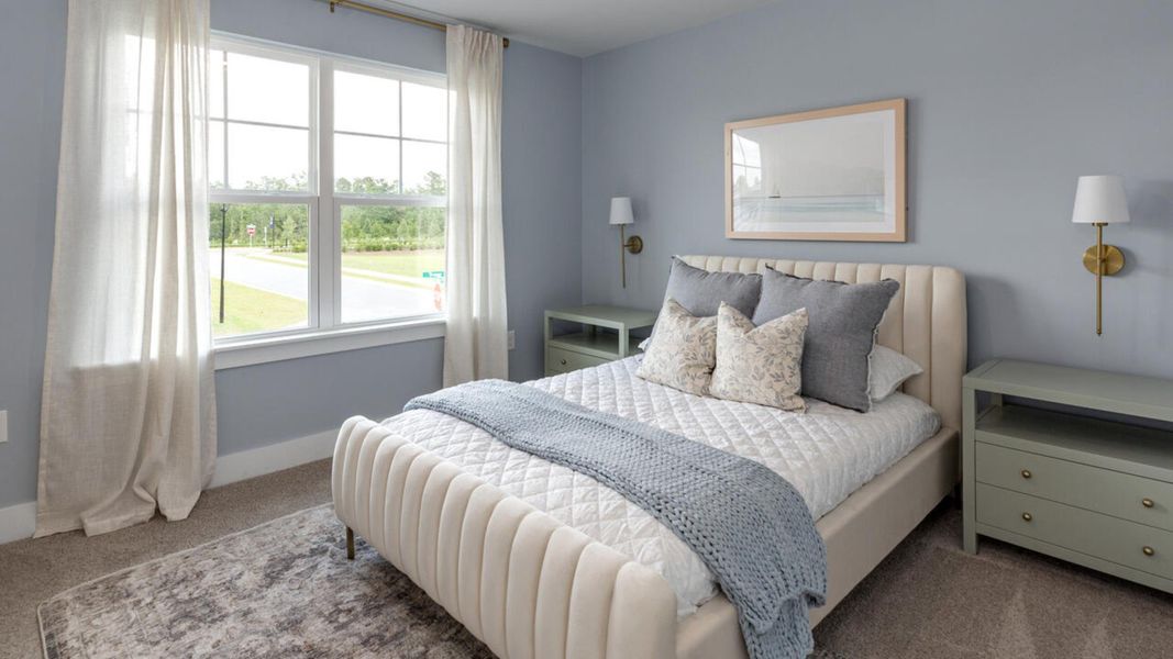 Furnished interior in a model home at Eagle Creek in Bolivia (Image 38).