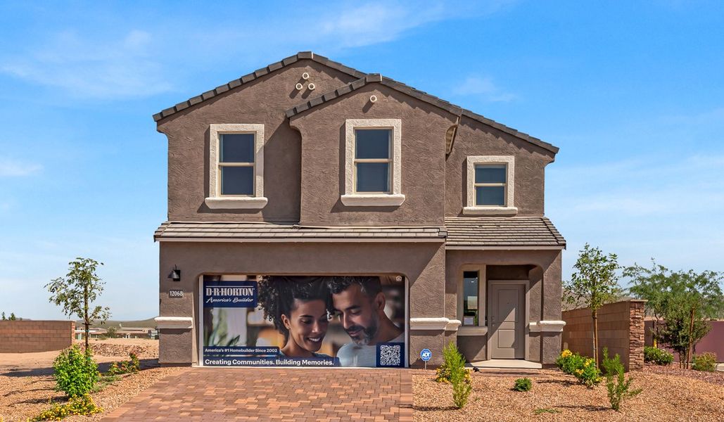 Front exterior of a home in the Coronet at Gladden Farms community, located in Marana, AZ (Image 4).