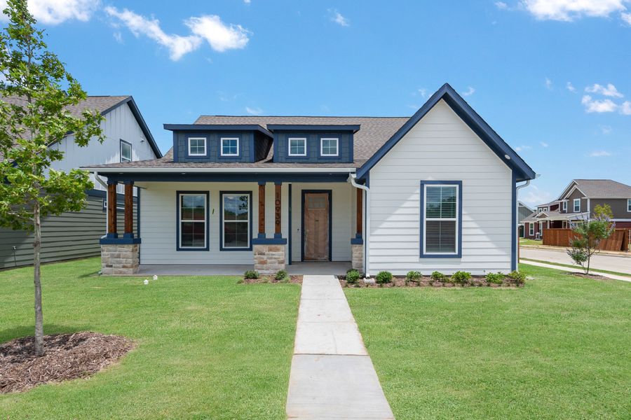 Front exterior of a home in the Heritage Towne community, located in Grand Prairie, TX (Image 20). Front exterior of a home in the Heritage Towne community, located in Grand Prairie, TX (Image 20).